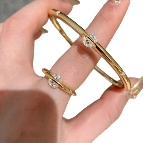 Pulseira Saturno banhado a ouro 18K/prata - Diâmetro: 6cm